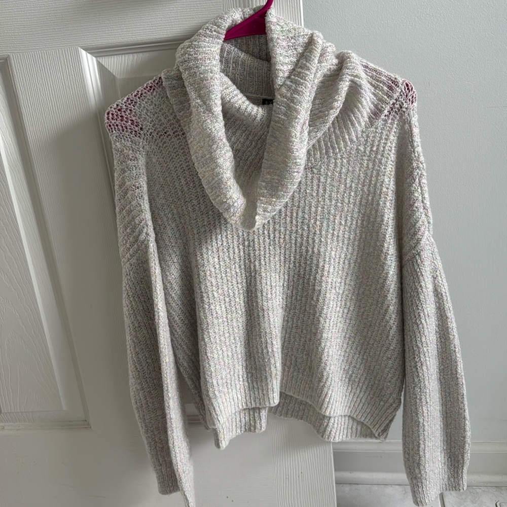 Express loose turtle neck sweater size small. Sparkly pink, blue, and white.